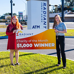 presenting October Charity of the Month check - Williston Animal Grouup